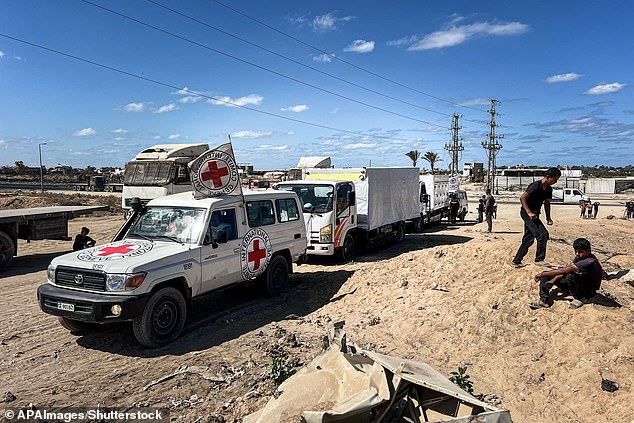 Red Cross teams dig through Gaza’s destroyed neighborhoods as search for missing Israeli hostages’ bodies intensifies amid pressure from families and global mediators