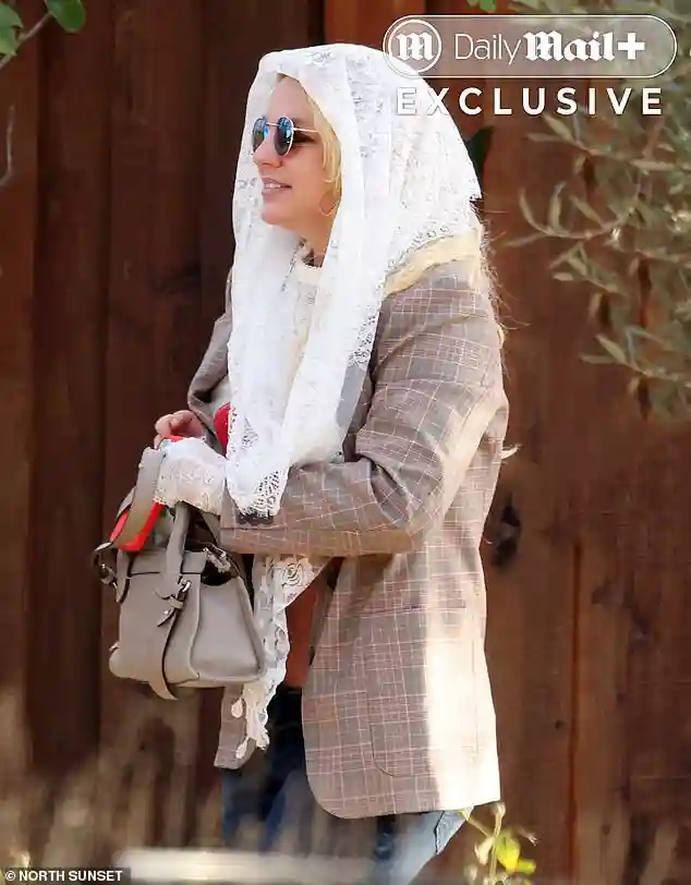 Britney Spears sparks renewed concern after leaving Westlake Village wine bar looking disheveled and driving off alone in black BMW