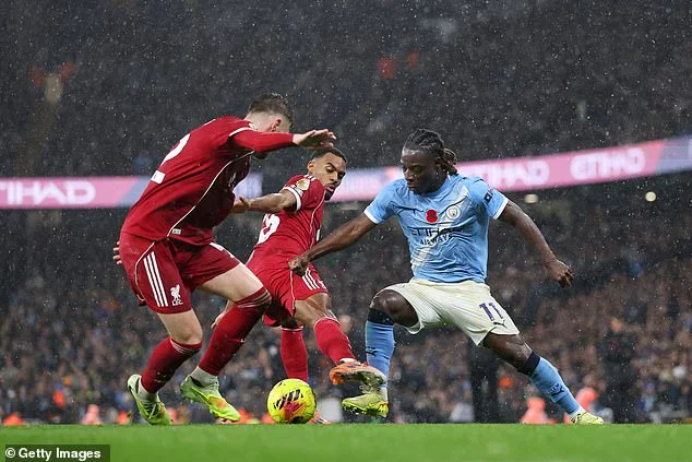 Jeremy Doku Stuns Liverpool Defender Conor Bradley with Brilliant Dribbling and Top Corner Goal at the Etihad Stadium in Manchester