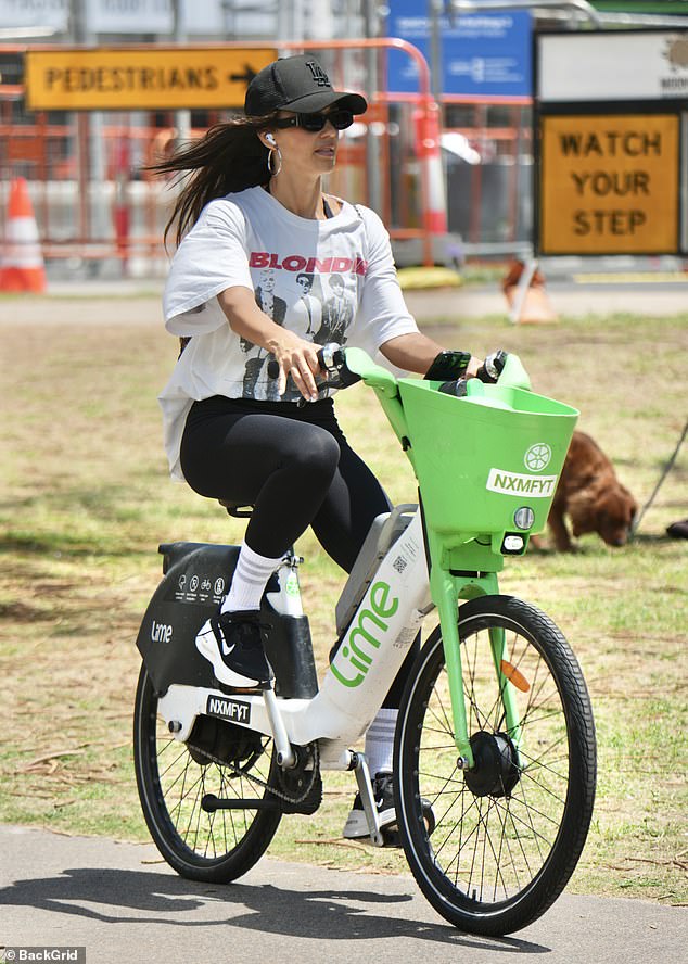 Jessica Alba enjoys a relaxed e-bike ride while filming her new spy thriller on the Gold Coast in Australia