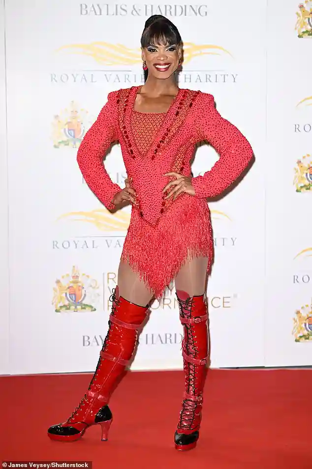 Johannes Radebe stuns crowds with a dazzling drag transformation as he arrives at the Royal Variety Performance in London
