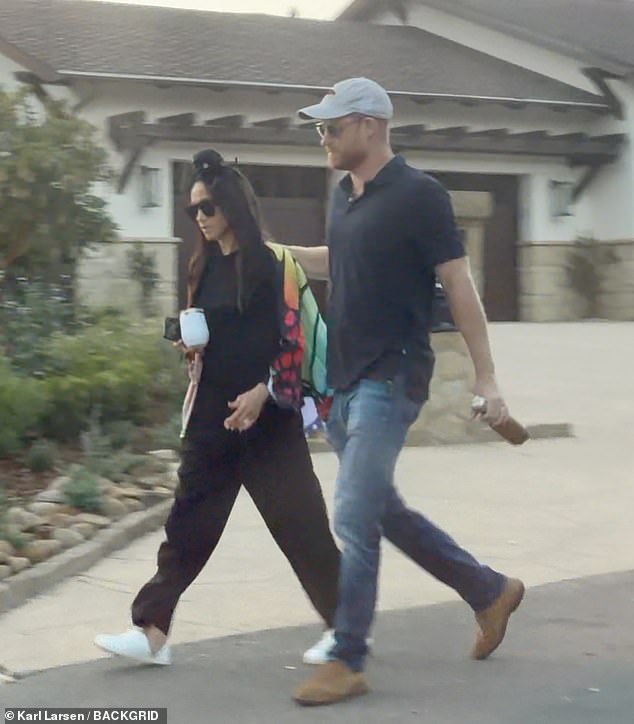 Meghan Markle takes Prince Archie and Princess Lilibet trick or treating in Santa Barbara while Prince Harry skips the costume fun during rare Halloween outing