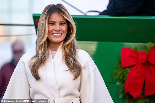 Melania Trump greets the White House Christmas tree as she ushers in the holiday season in Washington D.C.