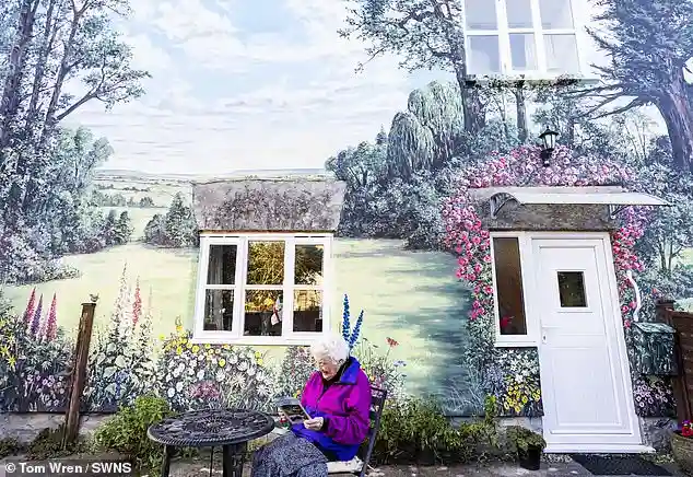 Muriel Baker transforms the side of her Somerset home with a mural to create a dream garden at 94