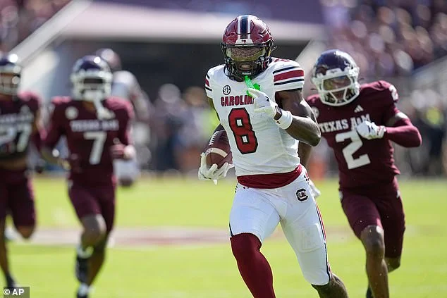 Nyck Harbor and Oscar Adaway III are confronted by a Texas police officer in a bizarre tunnel incident during the South Carolina versus Texas A&M matchup
