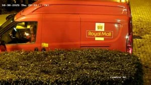 Royal Mail stands down postman in the UK after video emerges showing him allegedly smoking a pipe in his delivery van
