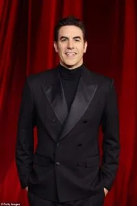 Sacha Baron Cohen is spotted chatting flirtatiously with influencer Kelsey Calemine outside a new Hollywood nightclub in the early hours