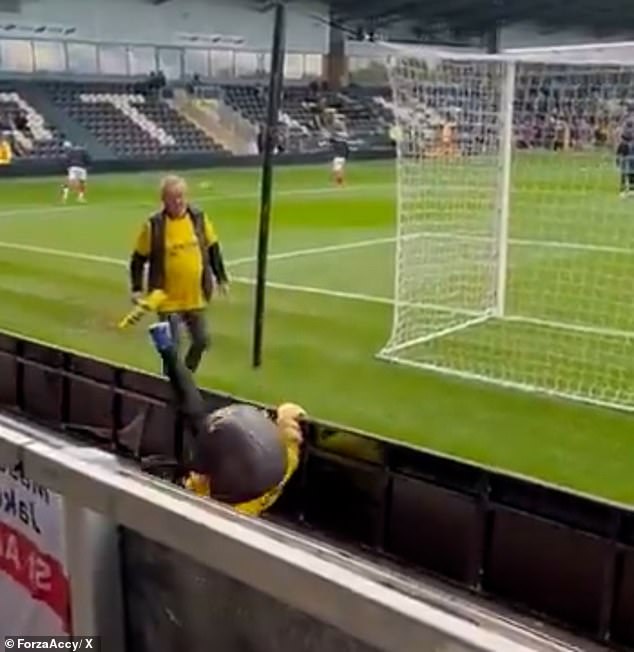 Sammy the Saint mascot trips over advertising board and is escorted off Pirelli Stadium before St Albans City suffer heavy FA Cup defeat at Burton Albion